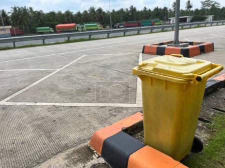 Inorganic organic waste bins of various colors in public places and parking lots