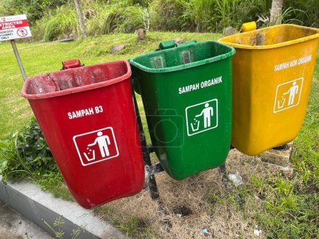 Inorganic organic waste bins of various colors in public places and parking lots
