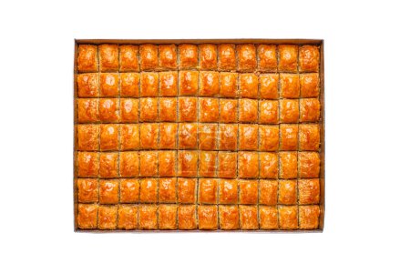 Photo for A tray of Turkish baklava sweets Stuffed with walnuts, isolated on a white background - Royalty Free Image