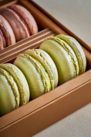 Colorful French macarons with pistachios