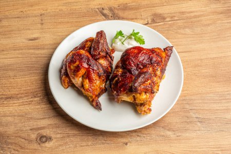 Photo for Top View photo of a grilled chicken dish on a wooden floor - Royalty Free Image