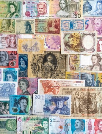 Photo for Old banknotes depicting iconic women or different countries - Royalty Free Image