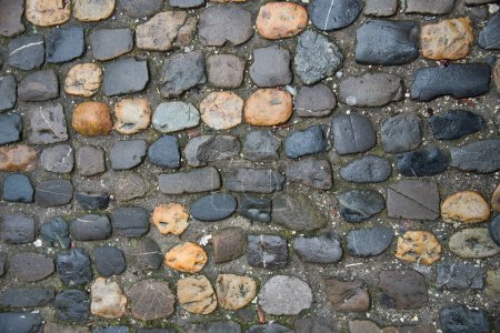 Foto de Textura de piedra vieja con piedras y adoquines - Imagen libre de derechos
