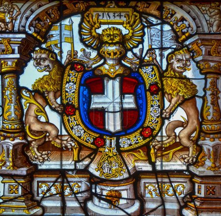 Medieval stained glass at the castle of Gruyeres. Swiss shield