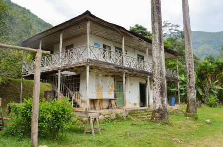 a once very beautiful old colombian coffee farm house now in decay