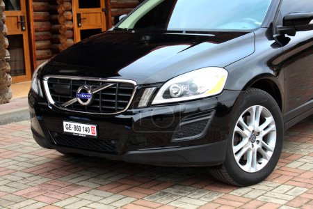 Photo for Vinnytsia, Ukraine; March 23, 2024. Black Volvo XC60 2012 at the city street. Sweden SUV Volvo XC60 at the parking. Front left view. - Royalty Free Image