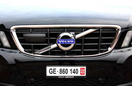 Photo for Vinnytsia, Ukraine; March 23, 2024. Black Volvo XC60 radiator grill. SUV Volvo XC60 front bumper. Volvo XC60 emblem and logo. Swiss car number. Front view. - Royalty Free Image
