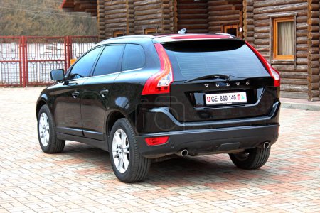 Photo for Vinnytsia, Ukraine; March 23, 2024. Black Volvo XC60 2012 at the city street. Sweden SUV Volvo XC60 at the parking. Rear left view. - Royalty Free Image