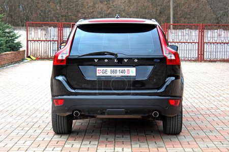 Photo for Vinnytsia, Ukraine; March 23, 2024. Black Volvo XC60 2012 at the city street. Sweden SUV Volvo XC60 at the parking. Rear view. - Royalty Free Image
