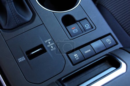SUV driving mode switch. Control panel for off-road functions. Off-road mode buttons. Management of interlocks, drive and low gear.