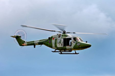 Photo for RNAS Yeovilton, Somerset, UK - July 10 2009: A Westland Lynx AH7 helicopter (ZD277) based at the RNAS Yeovilton, used by the Royal Marines, pictured at the 2009 RNAS Yeovilton International Air Day - Royalty Free Image