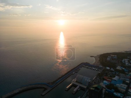 Photo for Harbor Sunrise, Peaceful Island, City, Blue Sea in Liuqiu Island, Taiwan - Royalty Free Image