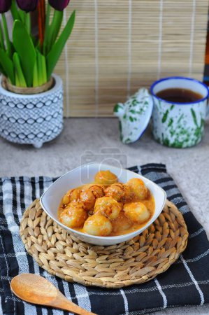 Photo for Cilok Bumbu Kacang, Aci Dicolok, Traditional Street Food from West Java, Made from Tapioca or Aci Flour. Cilok is a Round Shaped Ball with Peanut Sauc - Royalty Free Image