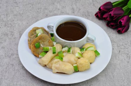 Photo for Pempek Palembang served in a white plate - Royalty Free Image