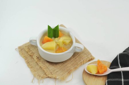 Breadfruit and sweet potato compote in a white bowl, a typical food suitable for breaking the fast