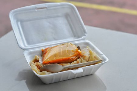 Photo for Roti Parata or Roti canai with lamb curry sauce - popular Malaysian breakfast - Royalty Free Image