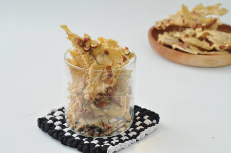 Rempeyek or peyek is a deep-fried savoury Indonesian-Javanese cracker