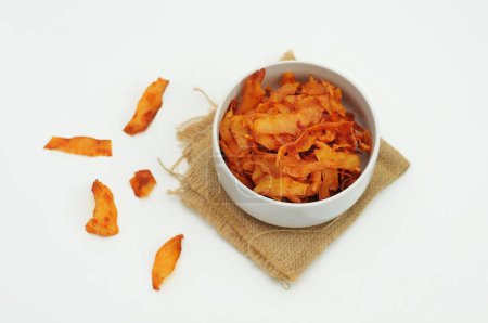 Photo for Cassava chips with spicy taste in a white bowl - Royalty Free Image