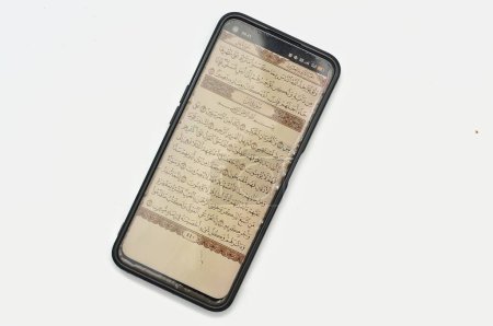 Photo for The Koran in digital form on your cellphone - Royalty Free Image