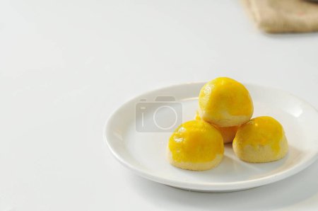 Pineapple tart is a small, bite-size tart filled or topped with pineapple jam, commonly found throughout different parts of Southeast Asia such as Indonesia (kue nastar)