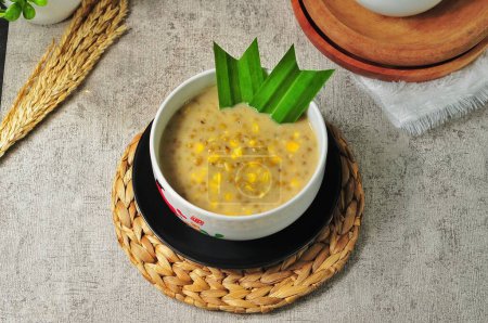 Photo for Green bean and corn porridge in a white bowl - Royalty Free Image