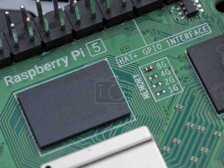 Photo for Galati, ROMANIA - November 10, 2023: Close-up of a Raspberry Pi 5 memory chip. The Raspberry Pi is a credit-card-sized single-board computer developed in the UK - Royalty Free Image