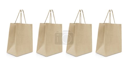 folded paper bag with handles isolated on white background