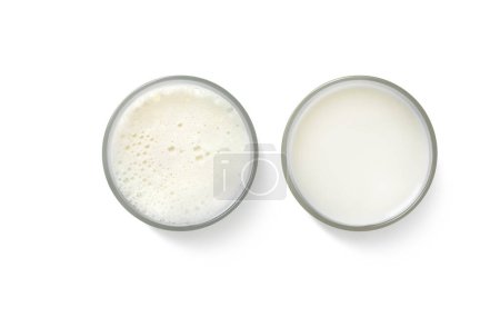 Milk in a glass. Top view. Isolated on a white background.