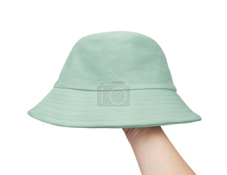 Hand covered with green bucket hat  white background