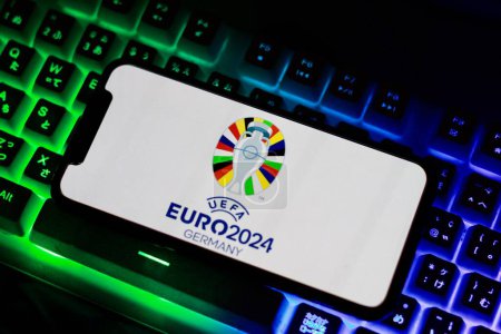 Photo for Indonesia - April 2nd 2024: UEFA EURO 2024 Germany football championship logo is displayed on the smartphone screen, this is the 17th edition of the UEFA EURO cup. - Royalty Free Image
