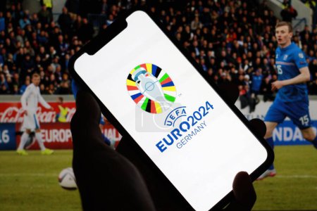 Photo for Indonesia - April 2 2024: UEFA EURO 2024 Germany football championship logo is displayed on the smartphone screen, this is the 17th edition of the UEFA EURO cup. - Royalty Free Image