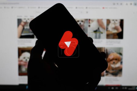 Photo for Indonesia - April 6th 2024: Hand holding smartphone With the Youtube Short logo is displayed on smartphone screen. - Royalty Free Image