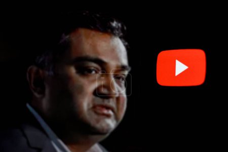 Photo for Indonesia - April 16th 2024: in this photo the logo of YouTube is displayed on a smartphone screen with CEO Neal Mohan in the background - Royalty Free Image