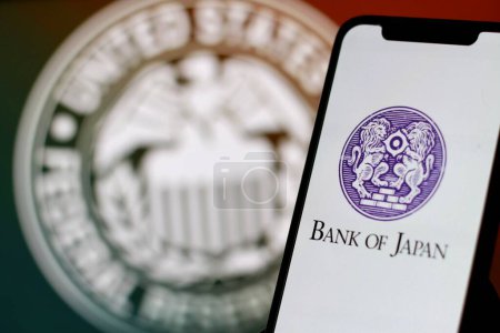 Foto de El logotipo del banco de Japón, BOJ, con sistema federal inverso, el logotipo de la Fed en el fondo. indonesia - 30 de abril de 2024. - Imagen libre de derechos