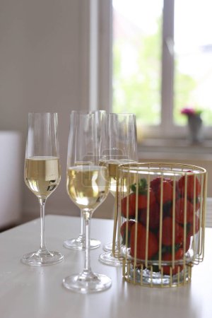 Photo for Glasses of champagne with strawberries. High quality photo - Royalty Free Image