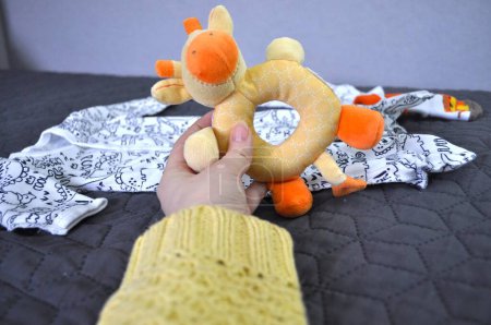 toy yellow giraffe rattle for children. newborns, pregnancy, baby shower, gender party,