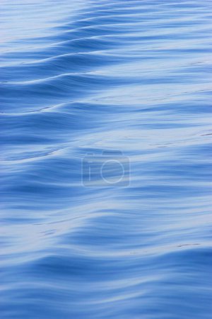 waves on a water surface, caused by ferry from Konstanz to Meersburg, Lake Constance, Germany