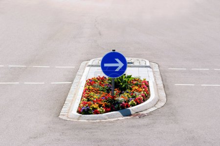 go to the right, typical traffic island in Munich, Bavaria, Germany