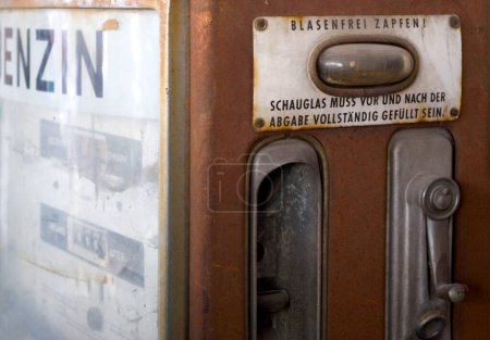 Munich, Bavaria, Germany, March 18th 2007, old rusty german petroleum pump, inscription in german, Benzin, Blasenfrei zapfen