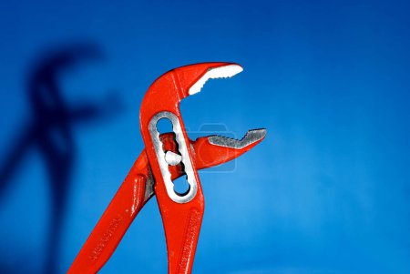 open, opened red Tongue-and-groove pliers
