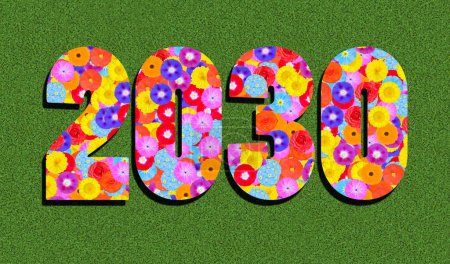 year written with colorful flowers on green background