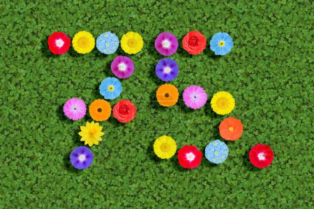 number written with colorful flowers on green background