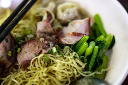 Photo for Egg noodle with wonton and red roasted pork. Asian food style. - Royalty Free Image