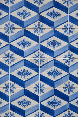 Colorful typical tiles on a wall in Portugal with traditional patterns
