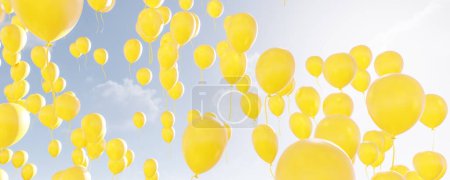 Foto de Un grupo de globos de color amarillo brillante se desplaza hacia arriba en el aire, sus cuerdas se arrastran detrás de ellos a medida que se elevan más y más alto. - Imagen libre de derechos