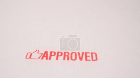 3 photo of red approved stamp inscription on white paper. High quality photo