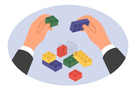 Hands businessman with toy bricks as metaphor for reorganization and restructuring company for reformation of business processes. Businessman is engaged in rebuilding own corporation or team building