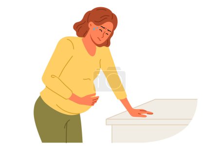 Pregnant woman holds stomach, standing near cabinet, experiencing pain due to complications caused by fetal development disorders. Pregnant girl needs hospitalization to avoid miscarriage
