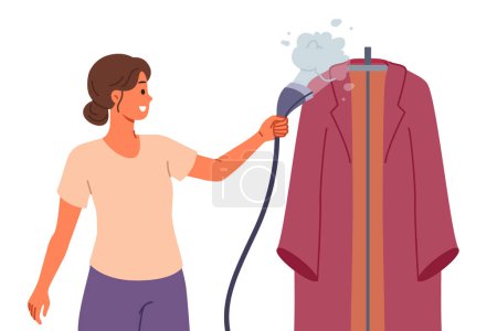 Dampfbügeleisen in der Hand einer Frau, die sich nach dem Waschen um Kleidung kümmert und Hausarbeit genießt. Glückliche Hausfrau mit Dampfbügeleisen zum Desinfizieren und Reinigen von Flecken an Oberbekleidung oder Abendkleidern