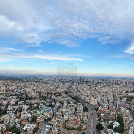 aerial view of Tel Aviv & Ramat Gan Cityscape in israel with golden sunset and clear sky